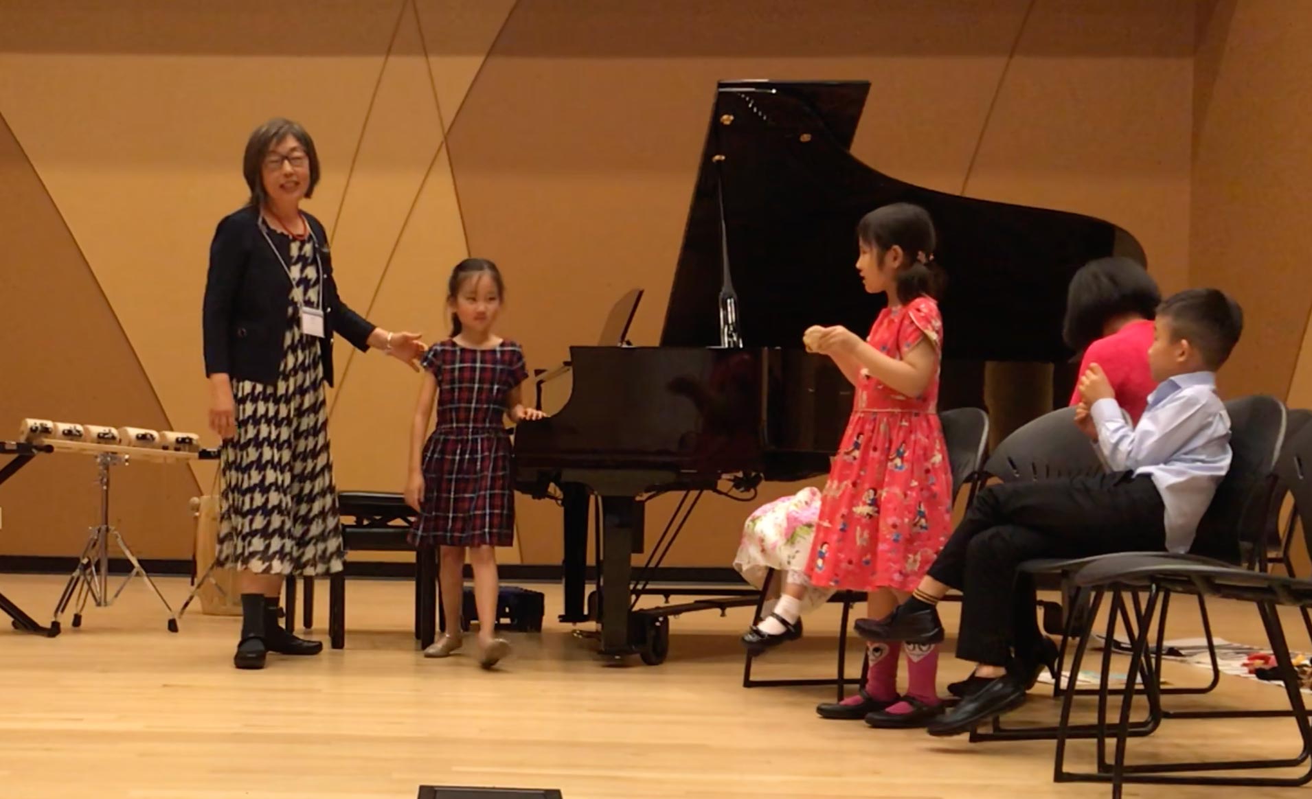 Piano teacher doing a demonstration